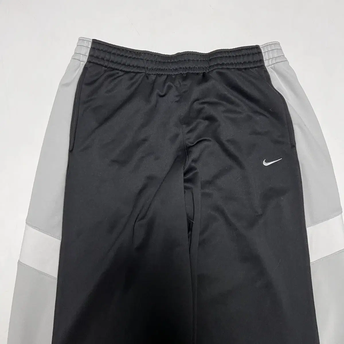 NIKE 나이키 스우시 사이드버튼 트레이닝밴딩팬츠(L)