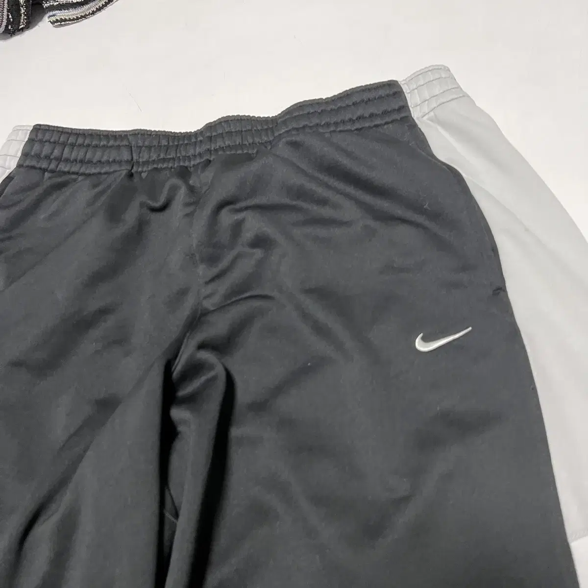 NIKE 나이키 스우시 사이드버튼 트레이닝밴딩팬츠(L)