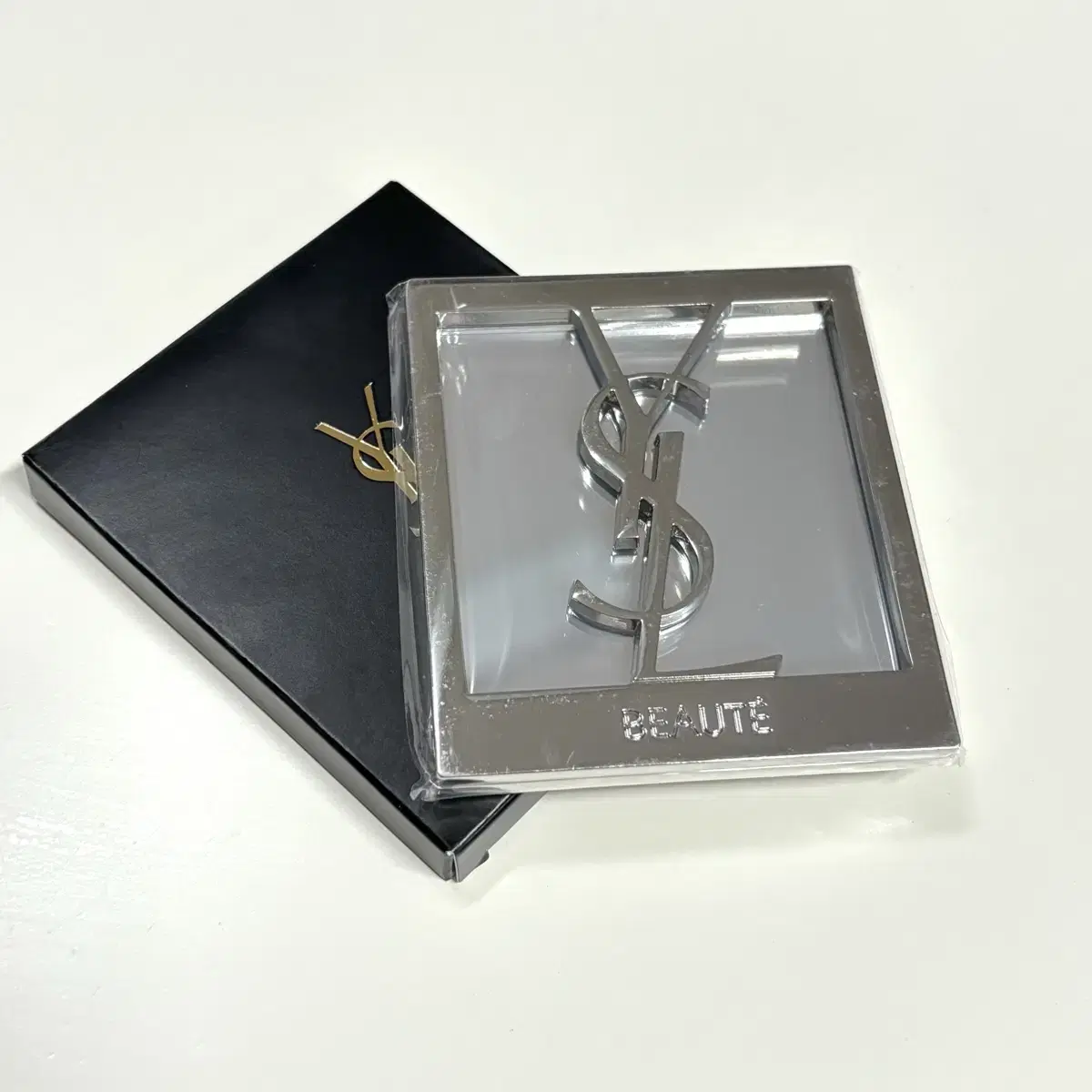 Genuine Yves Saint Laurent Silver Mirror for sale!