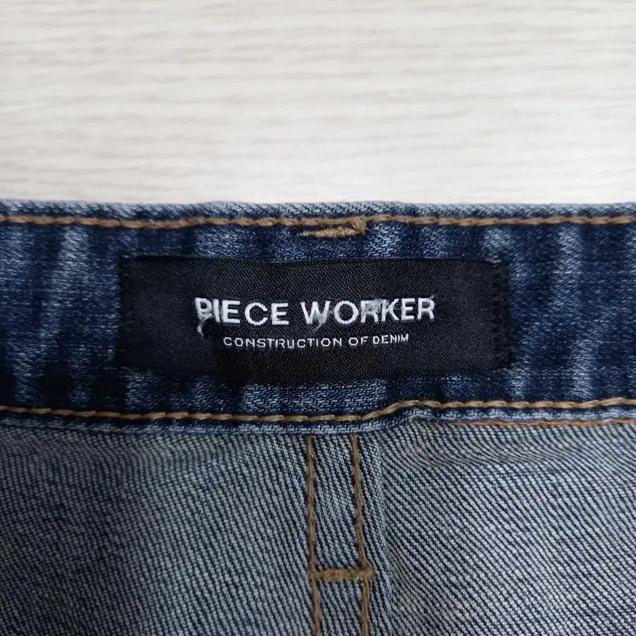 31 PIECE WORKER Kor 워싱 스판 슬림일자진 31-379