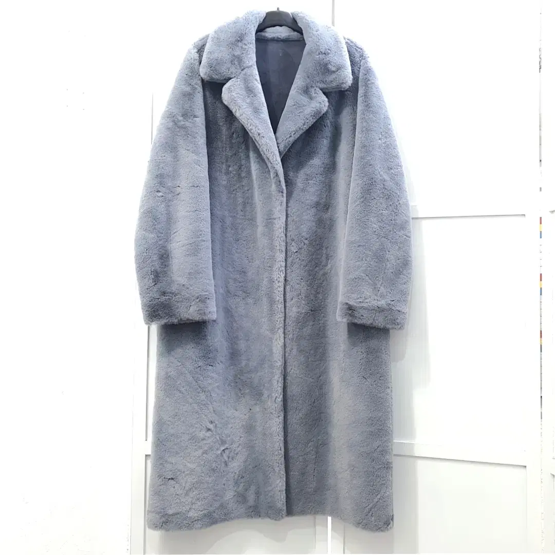 The IZIT Reversible Mouton Coat