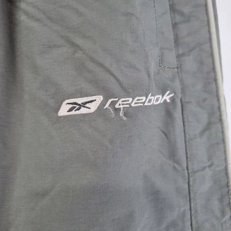 F3496 REEBOK 남3234인치 트레이닝 우븐 팬츠/더크