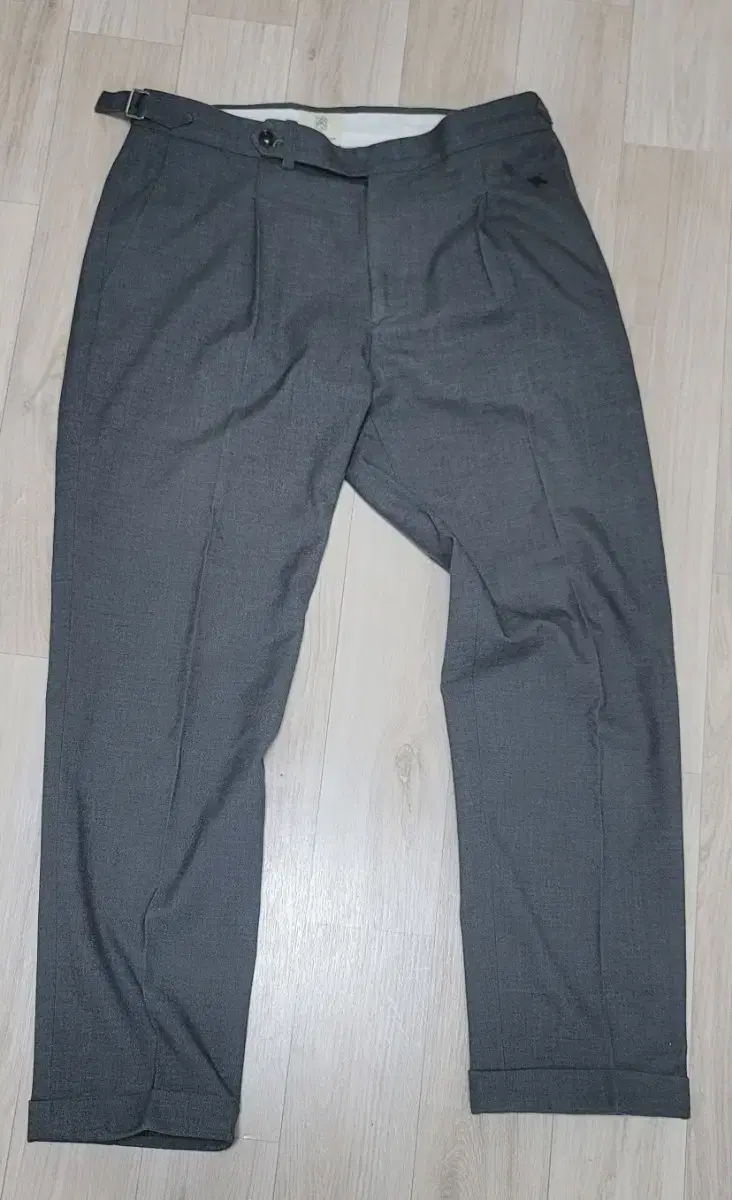 Slacks with sewn-in pants