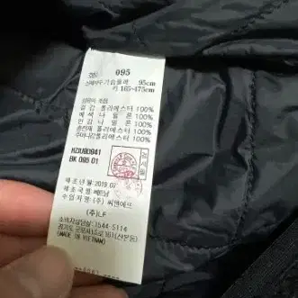 헤지스 뽀글이 후리스 조끼 집업