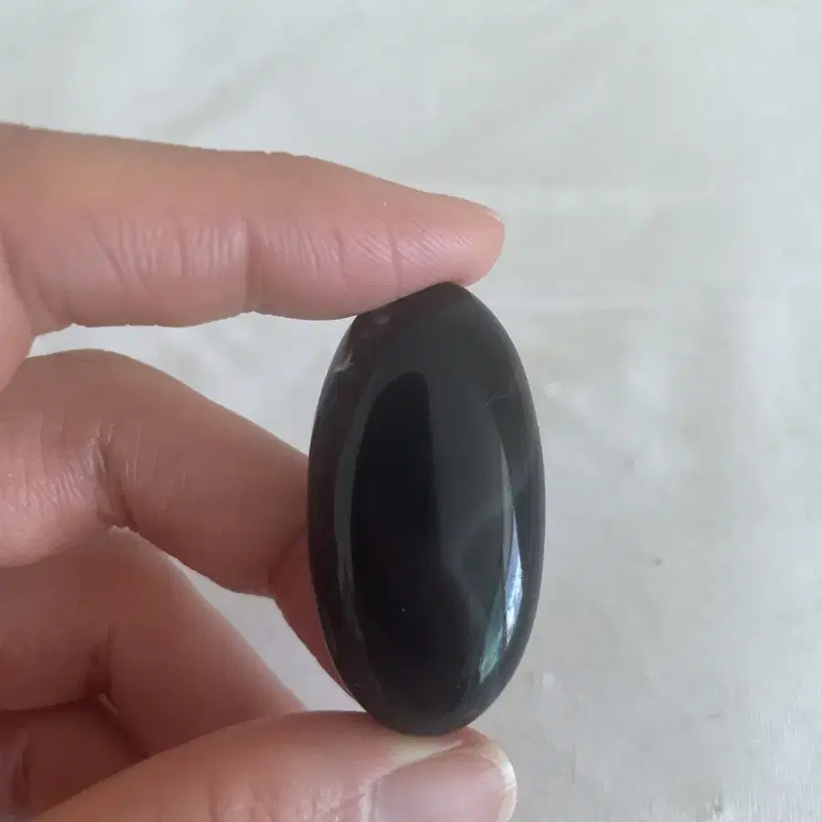 Black onyx (banded agate) cabochon