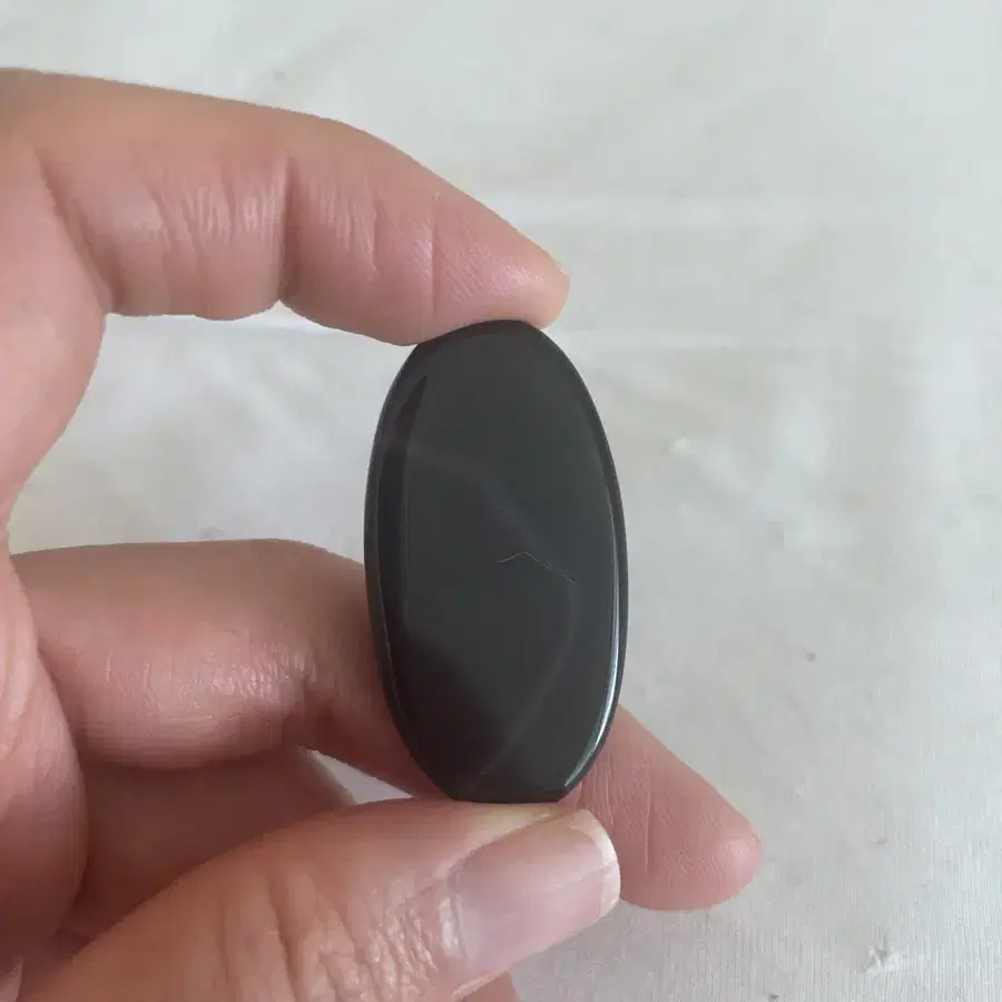 Black onyx (banded agate) cabochon