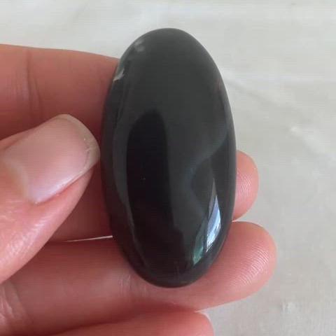 Black onyx (banded agate) cabochon