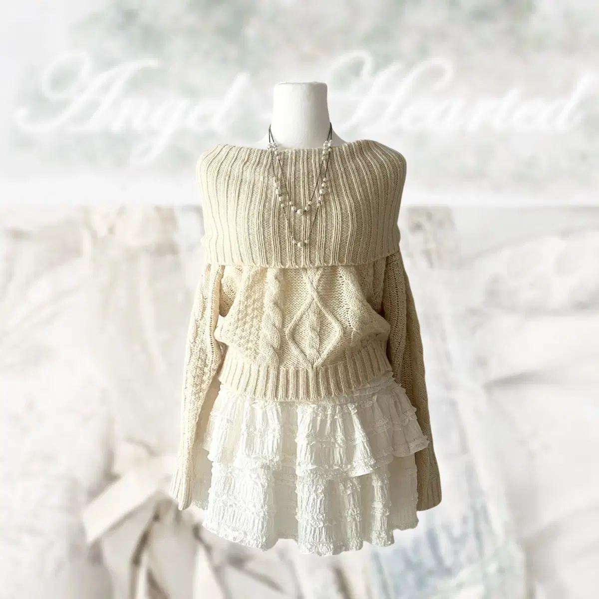 Ingni pale ivory off-shoulder knit