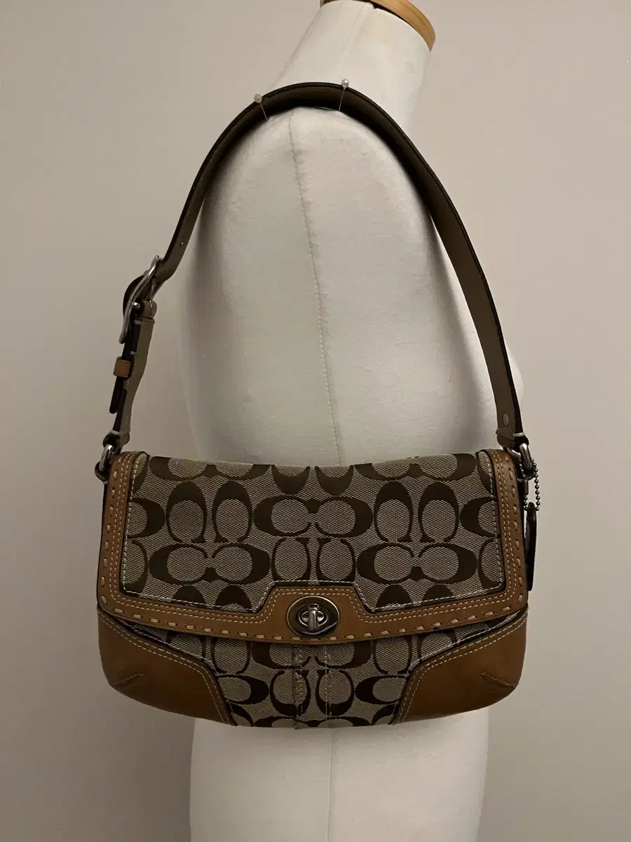 COACH light brown shoulder bag