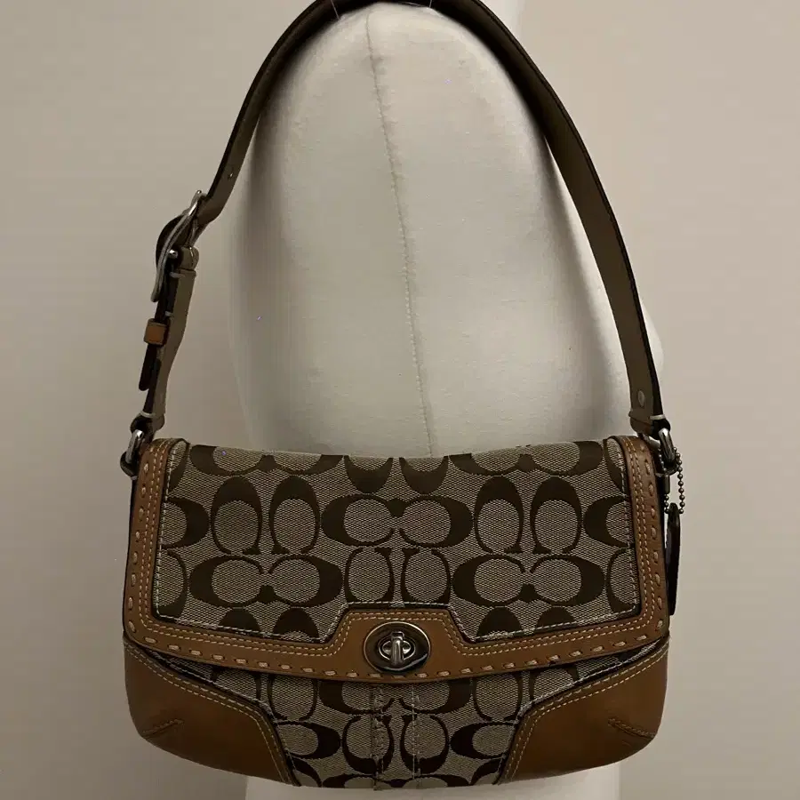 COACH light brown shoulder bag