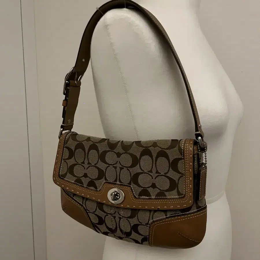 COACH light brown shoulder bag