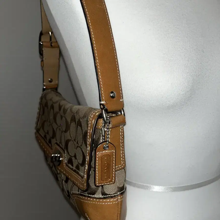 COACH light brown shoulder bag