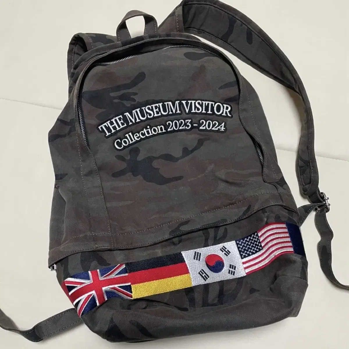 themuseumvisitor flag stitched backpack