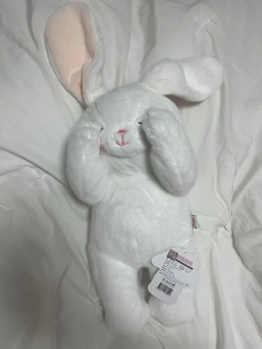 I'm selling a 30cm rabbit doll that is shy!