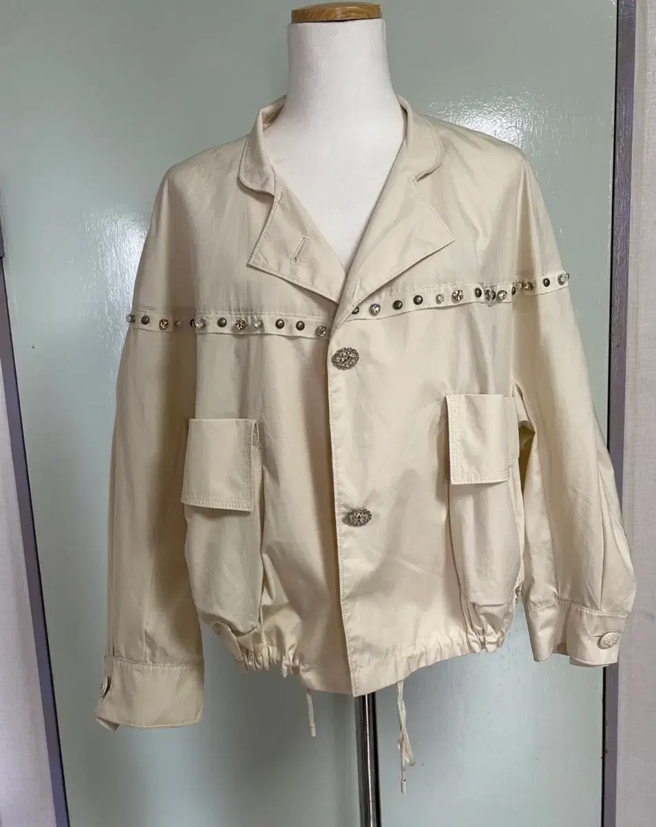 Time button beige jacket