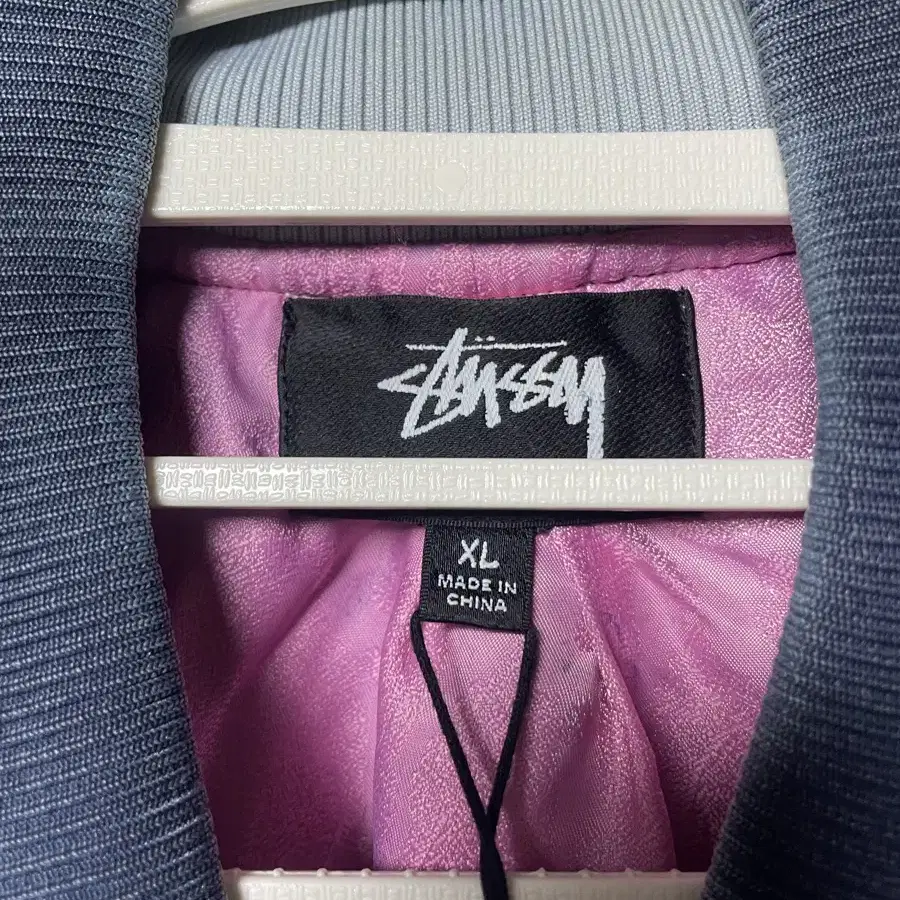 stussy dyed nylon bomber