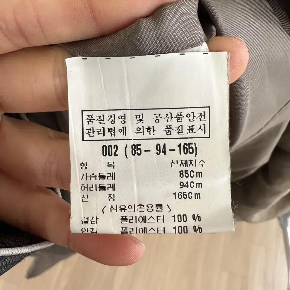 이세이미야케 브라운 링컬 드레이프 디테일 푸퍼 자켓