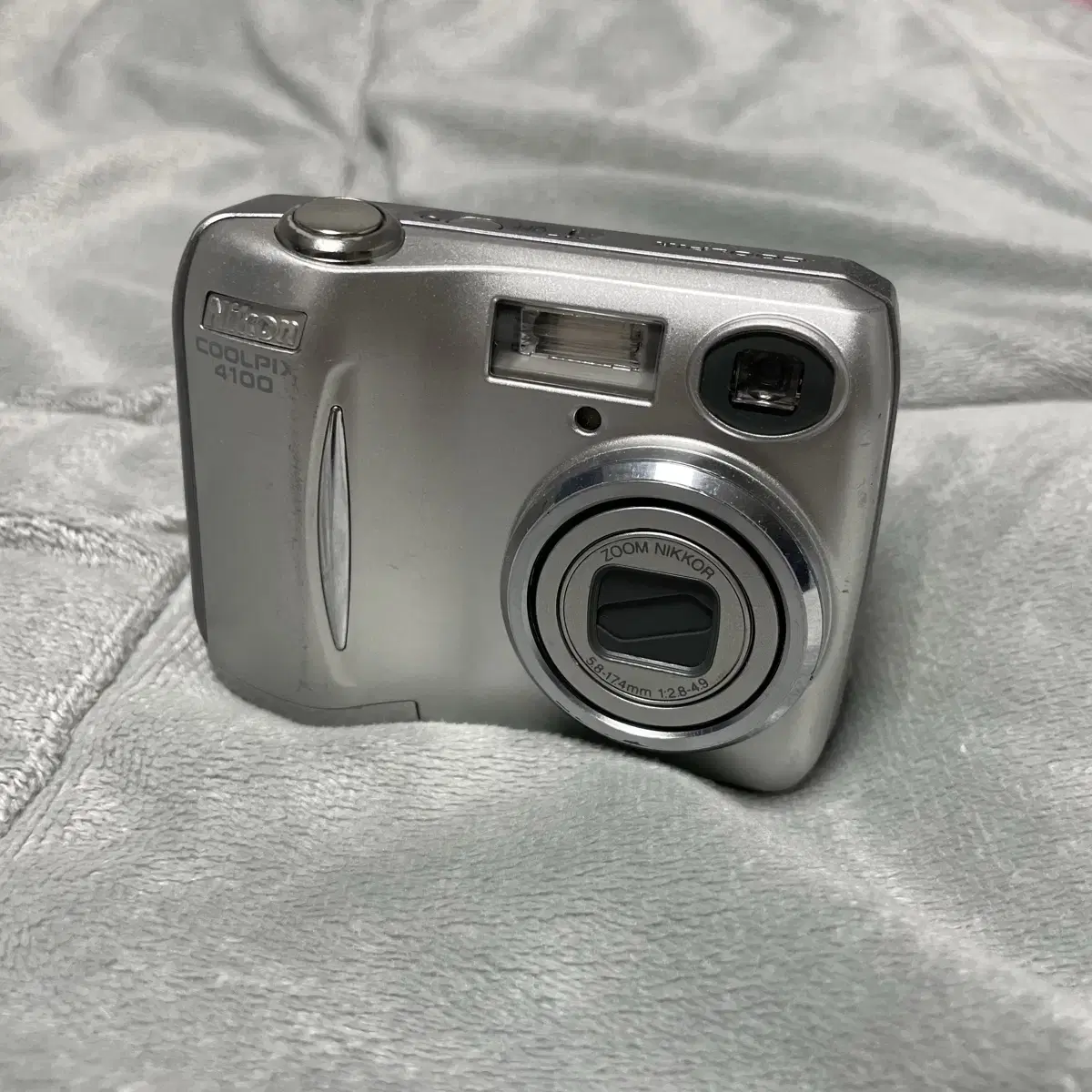 We are selling a Nikon Coolpix 4100 digital camera.