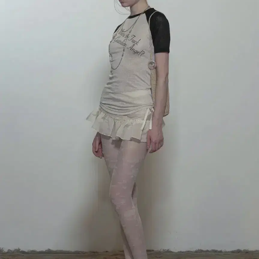 SCULPTOR Peekaboo Micro Sheer Skirt Raw