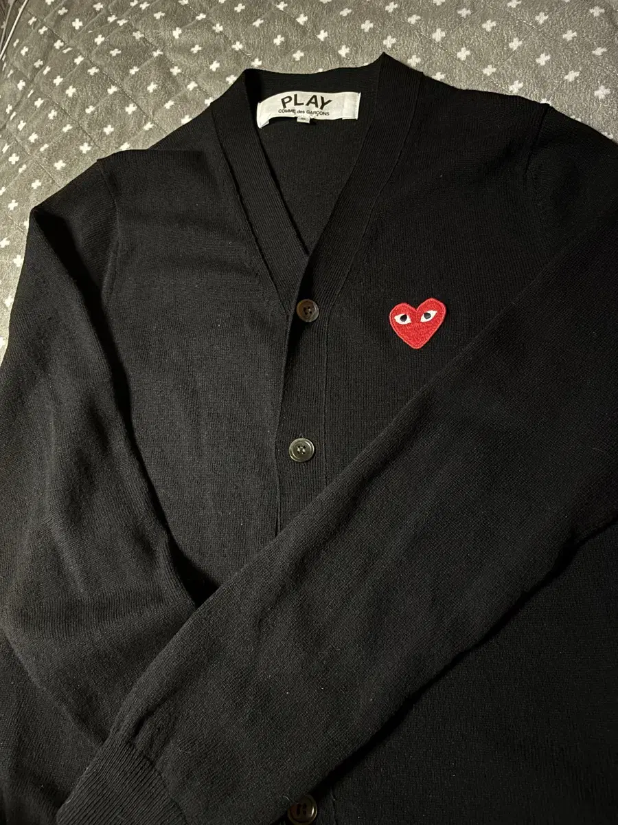 I'm selling a Comme des Garçons cardigan