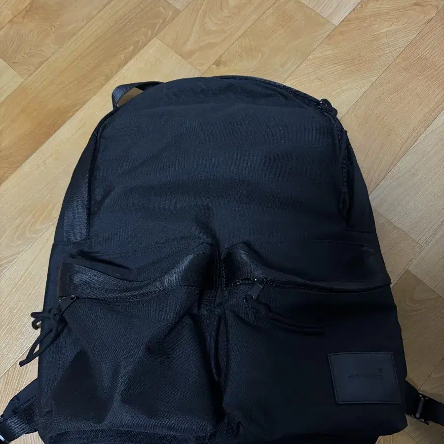 메종미네드 two pocket backpack