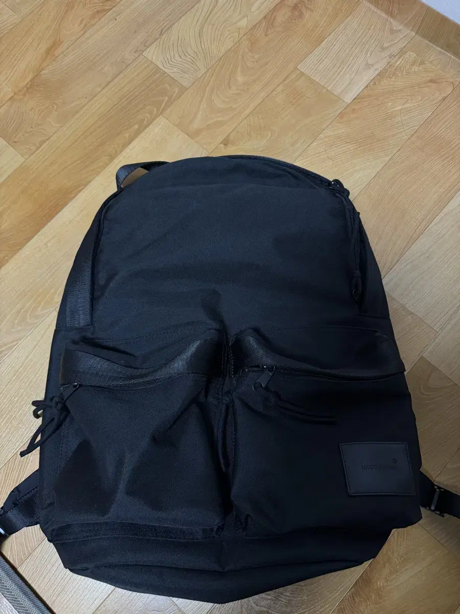 메종미네드 two pocket backpack