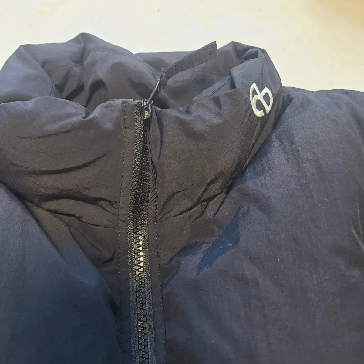 [L] 노매뉴얼 패딩 CURVE DOWN JACKET