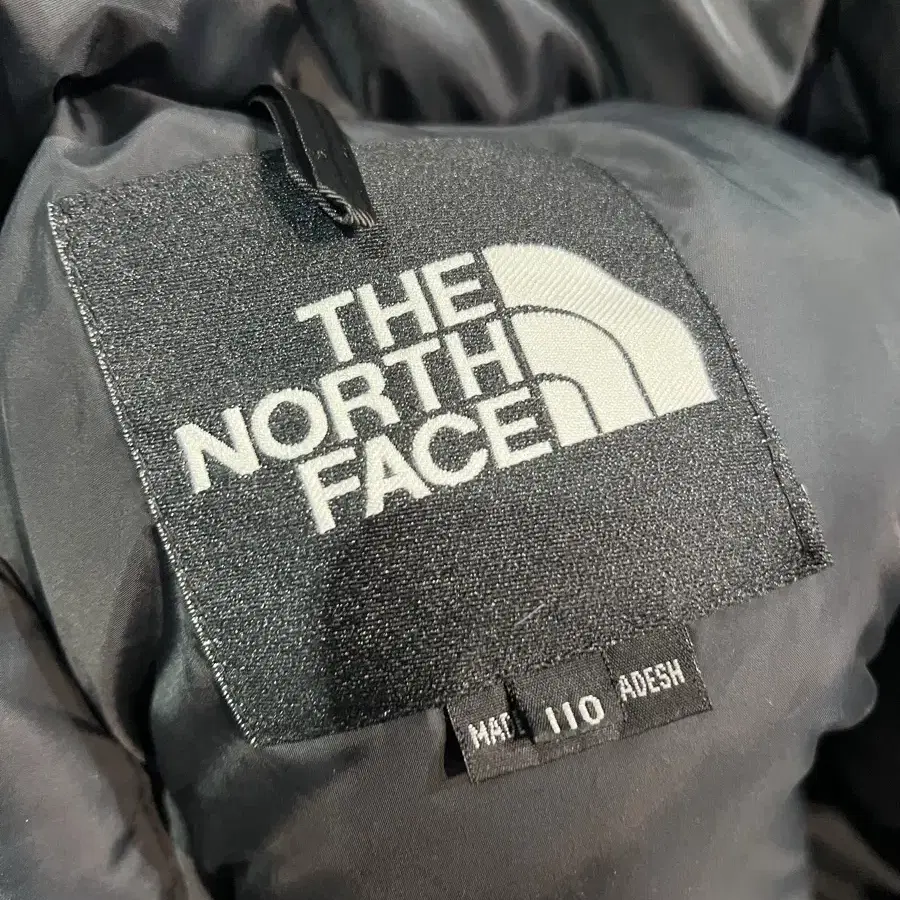 TNF 노스페이스 눕시 700 블랙