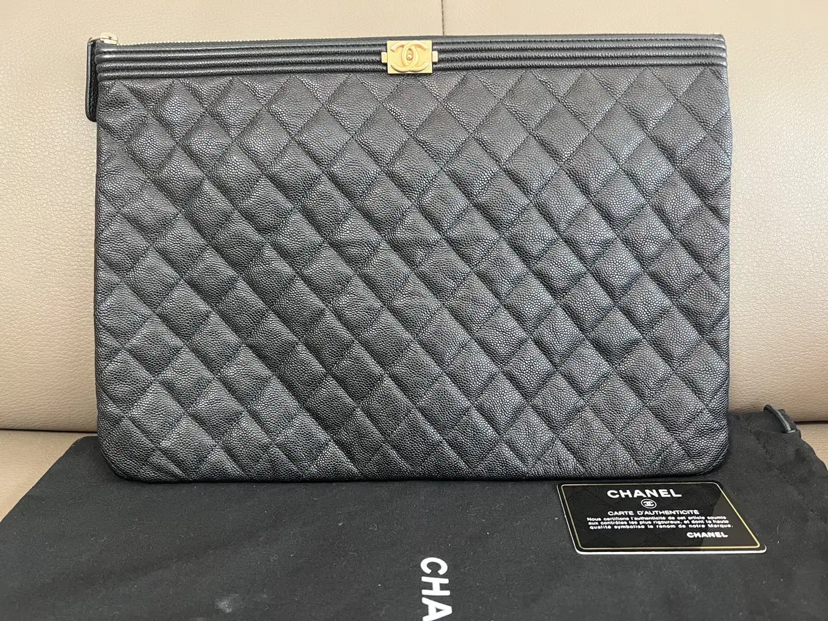 Chanel Caviar Boy Clutch Gold Large