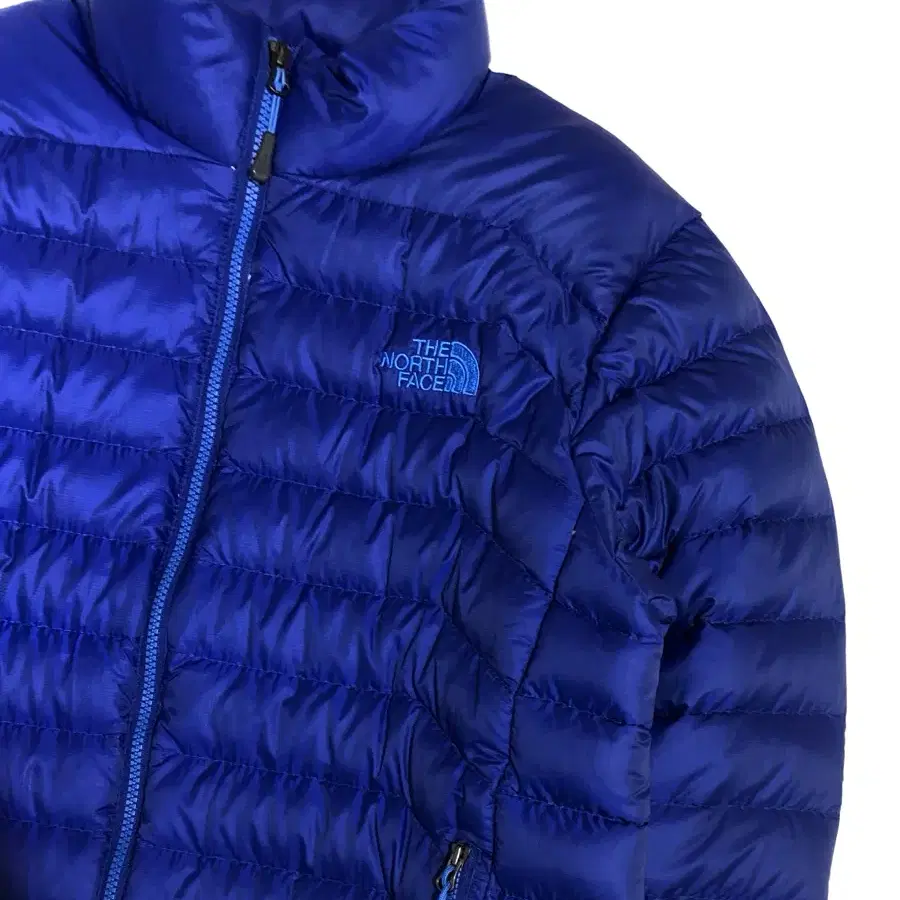 The North face 노스페이스 블루 경량 패딩