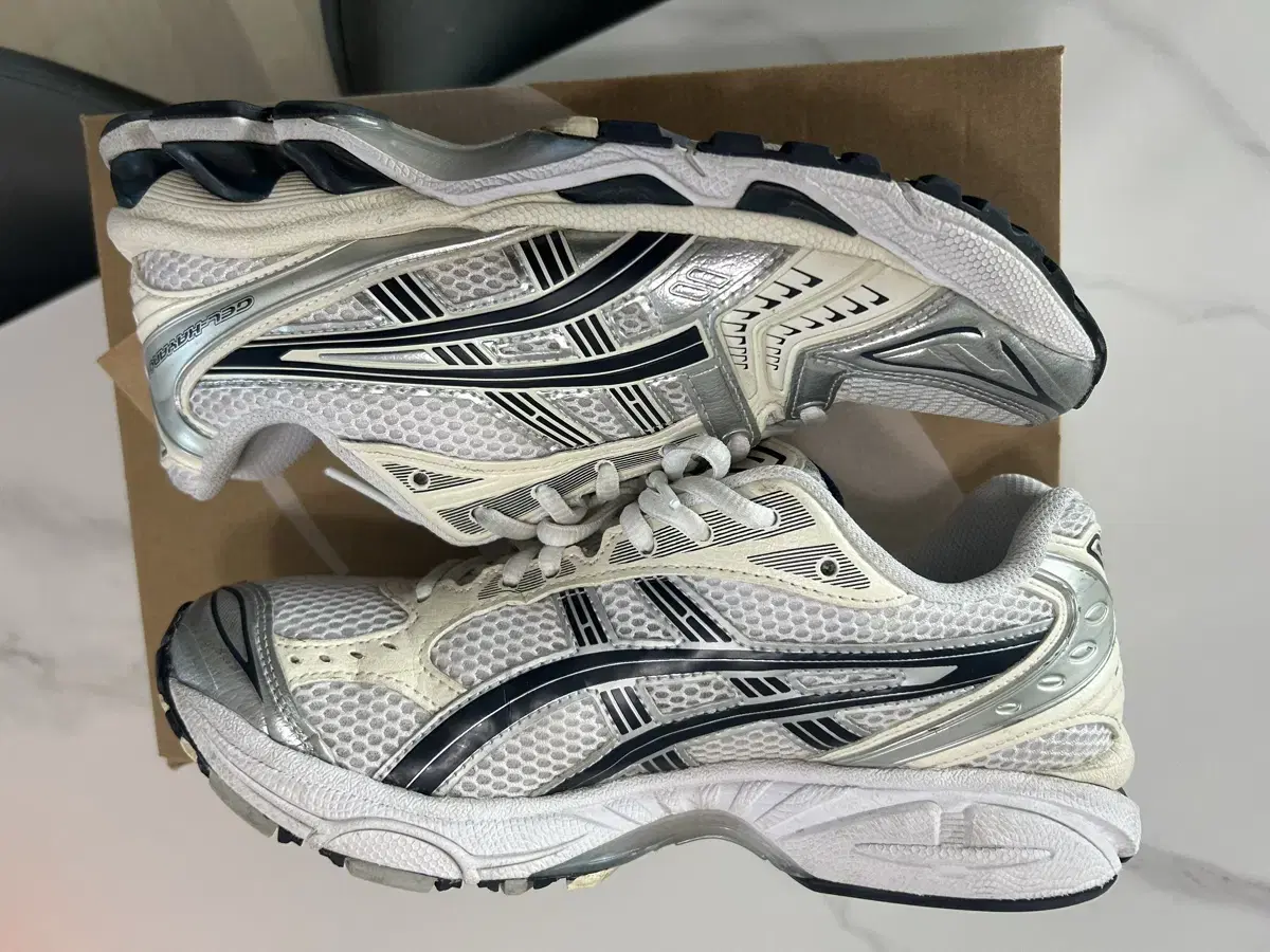 ASICS White Midnight 255 size