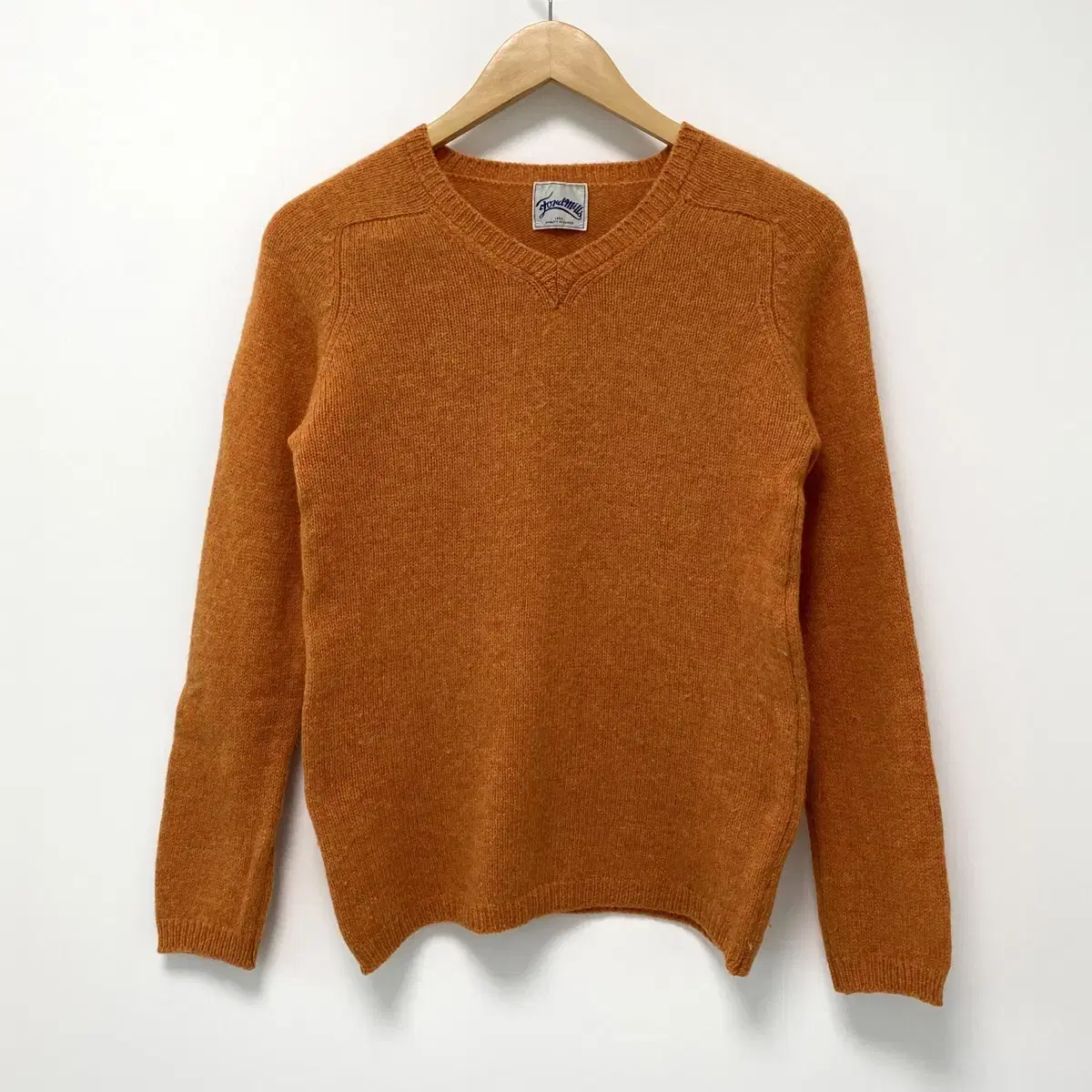 Orange wool V-neck knit