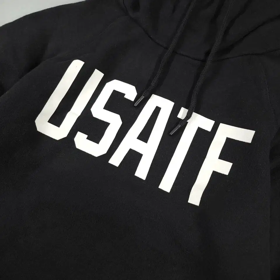 나이키 블랙 USATF 퓨추라로고 프린팅 코튼 스웻 레글런 세미크롭 하이