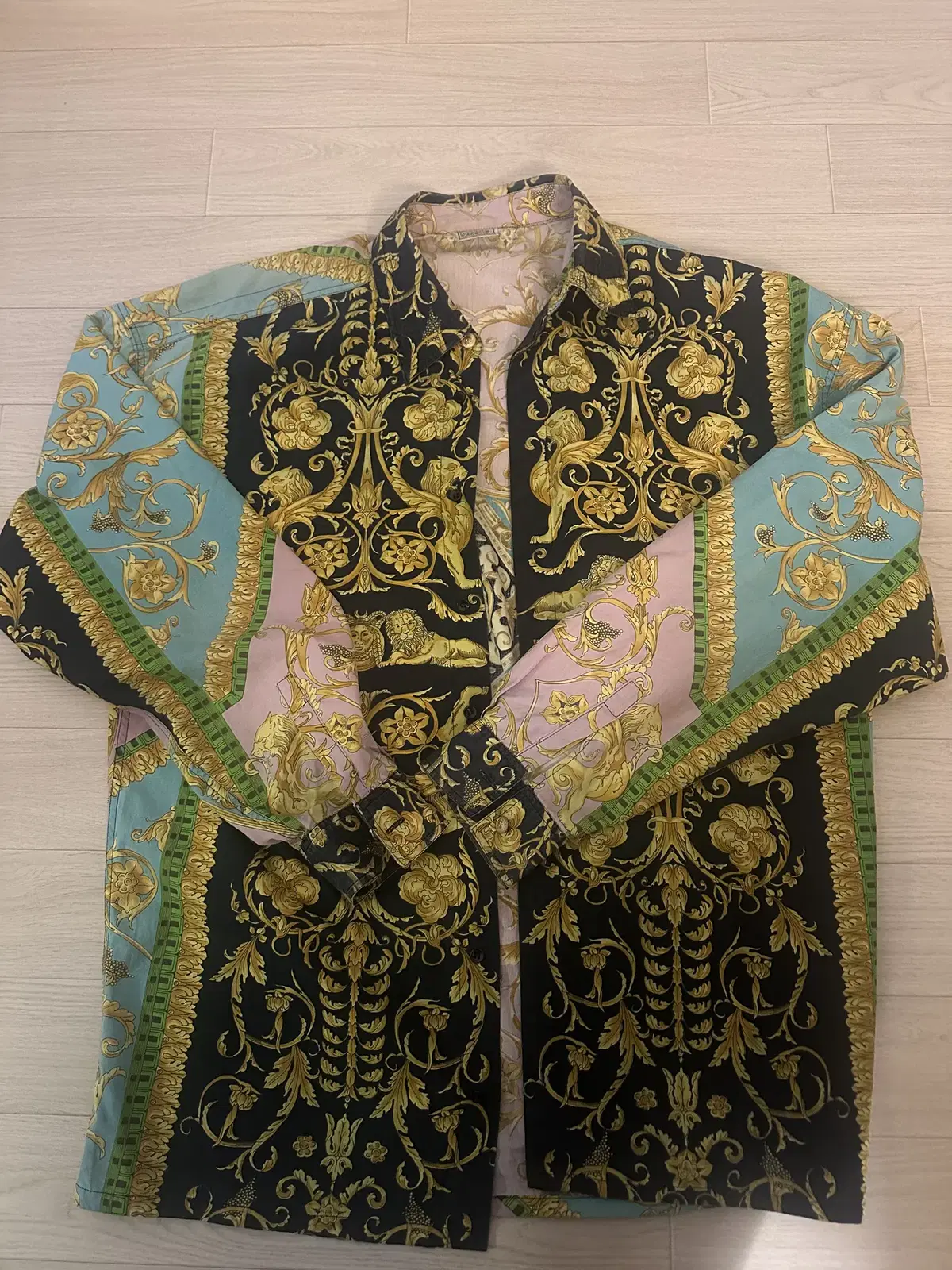 Two Versace shirts