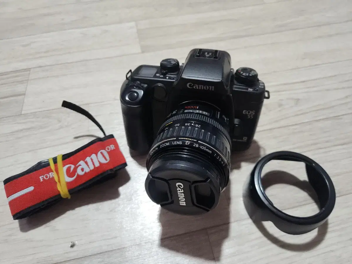 Canon EOS 55 black body and 28-105mm F3.5-4.5 lens