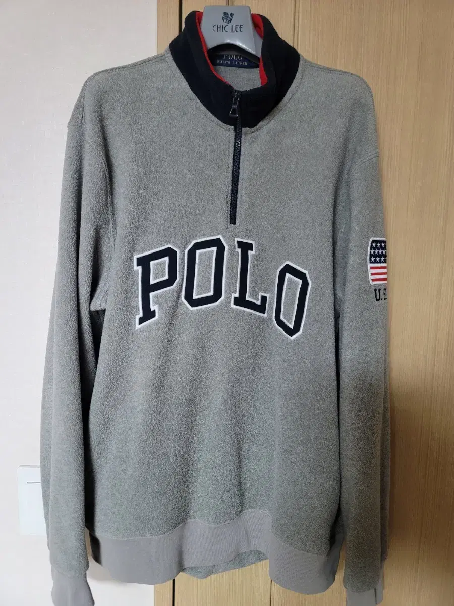 We are selling Polo Ralph Lauren fleece half-zip pullover (large)