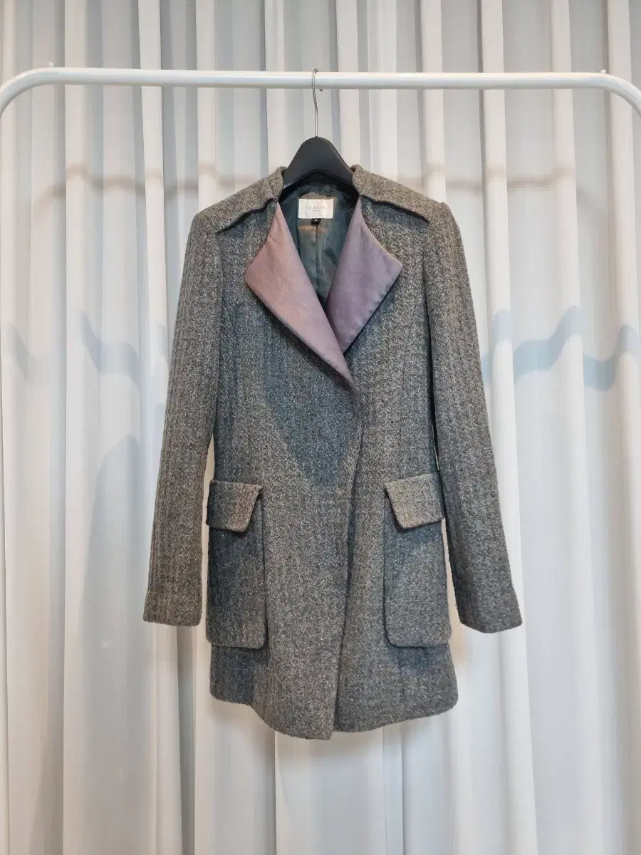 Tweed jacket with a subtle pearl feel