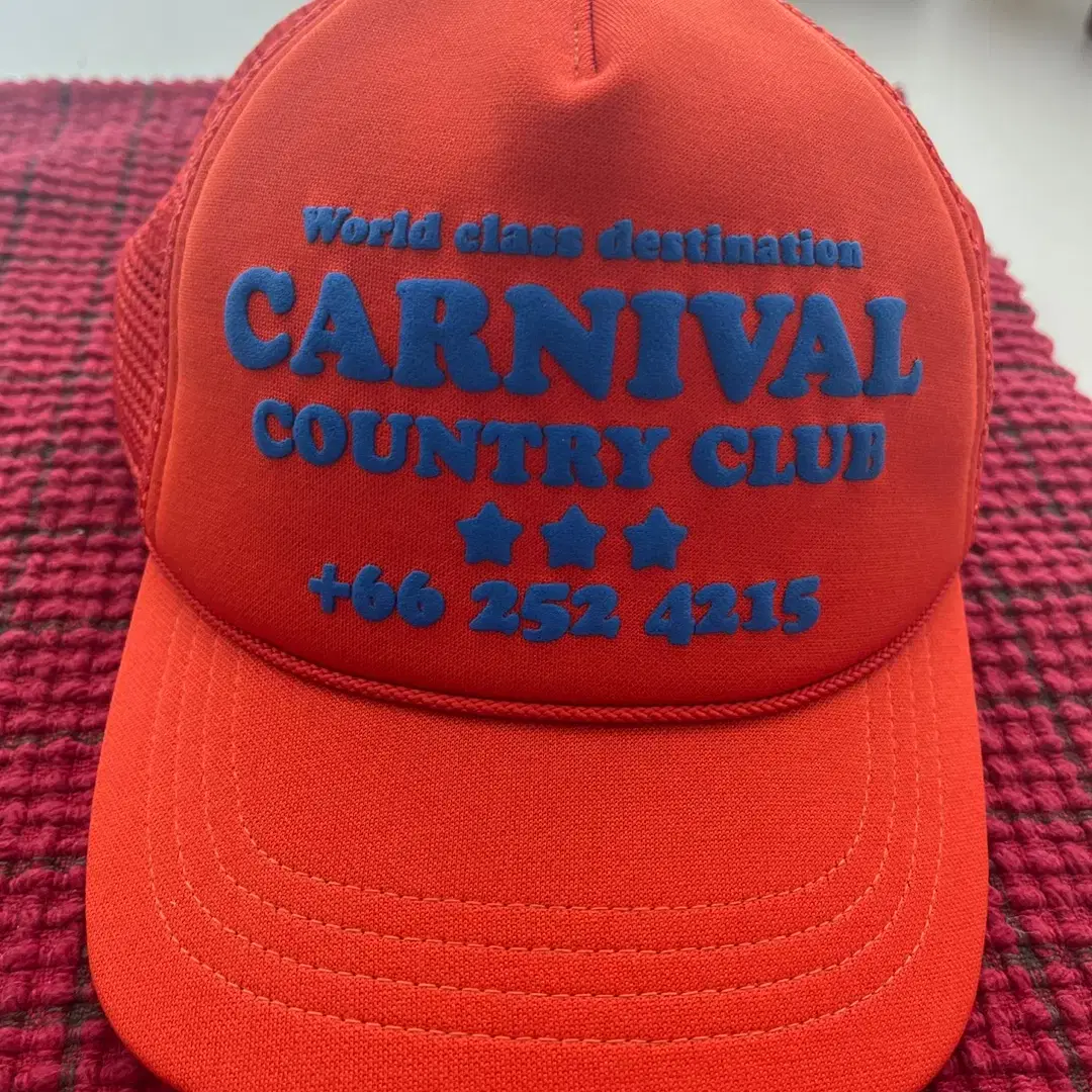 CARNIVAL 오렌지 메쉬 캡