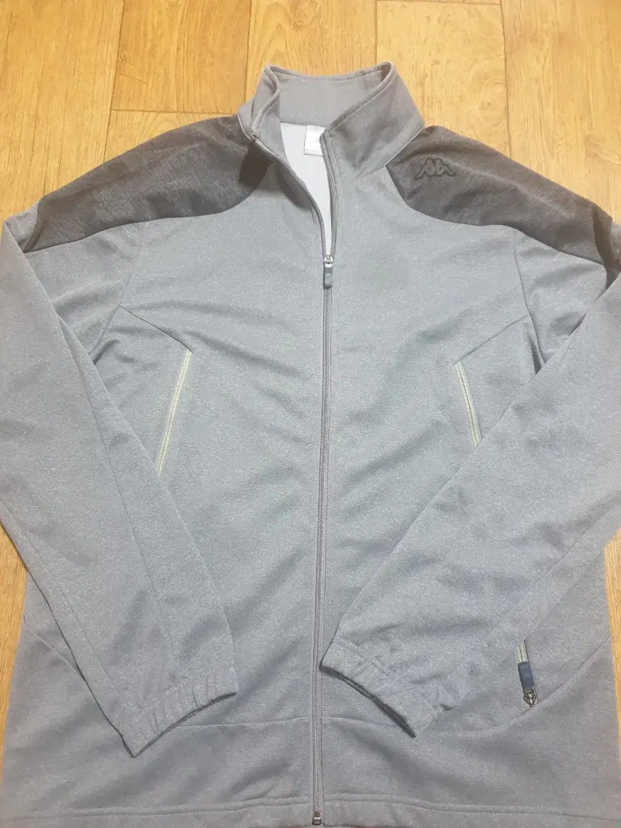 This is a size 105 zip-up hoodie from Kappa.