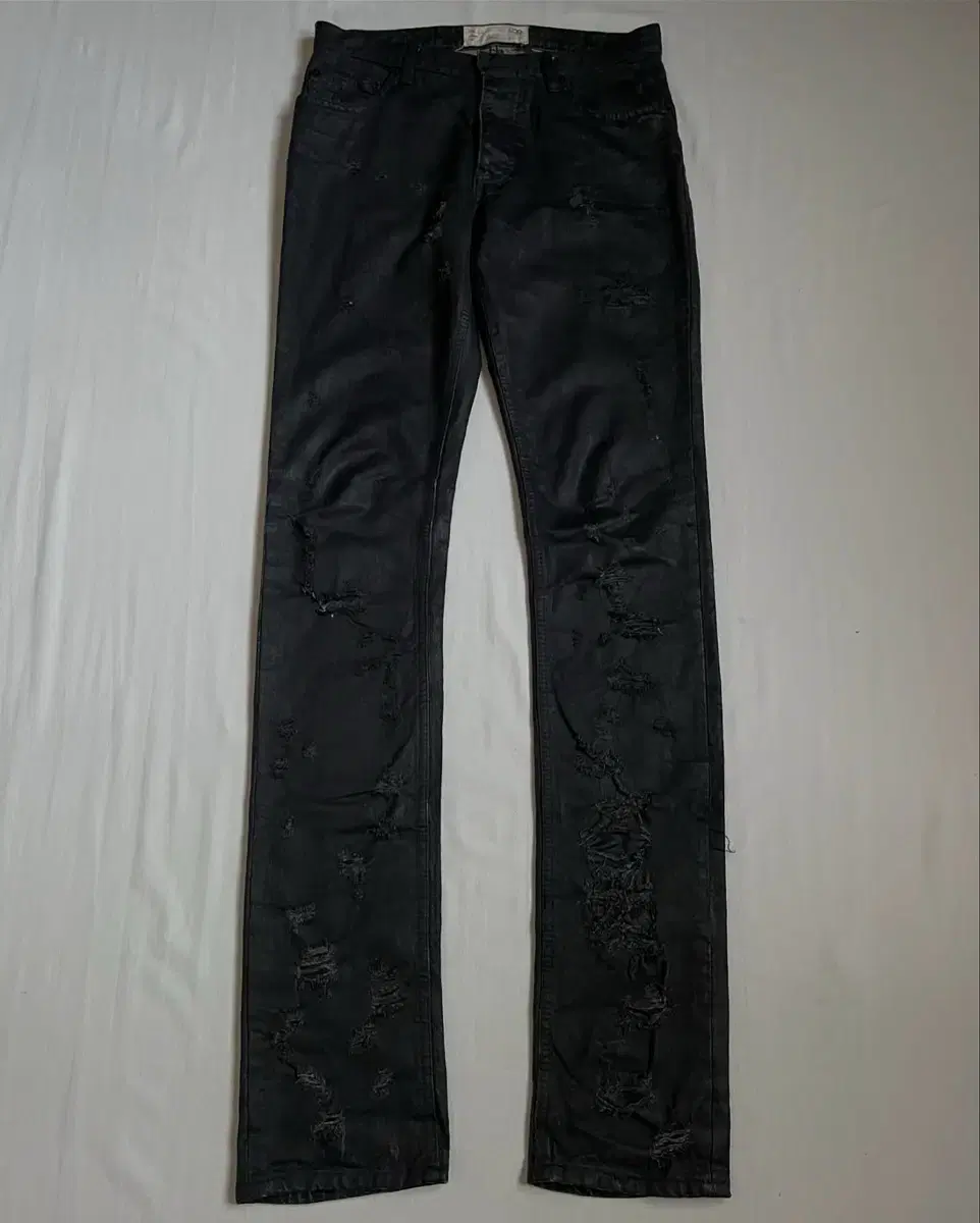 Destroyed & Coated Jeans