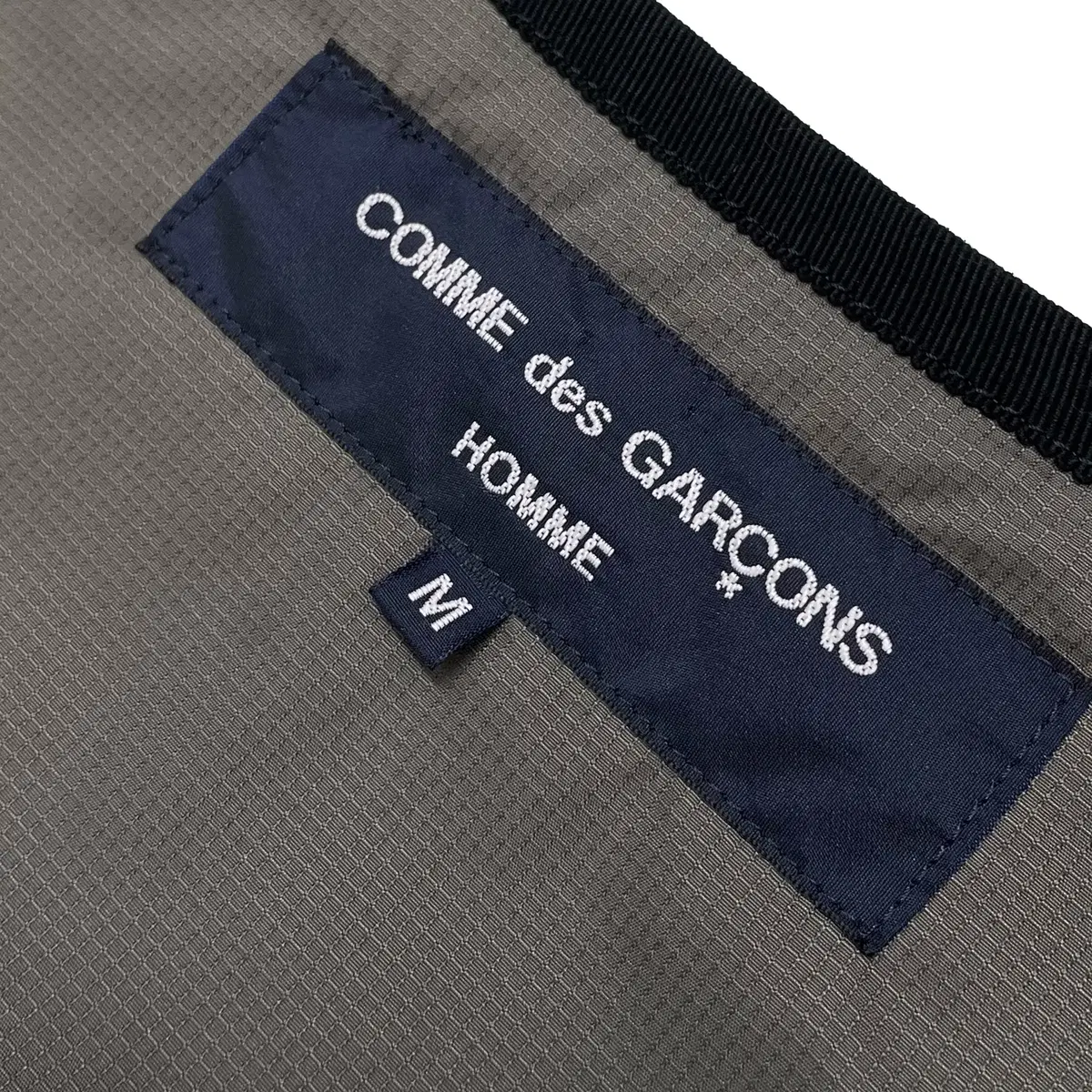 꼼 데 가르송 옴므 (Comme des Garcons Homme)