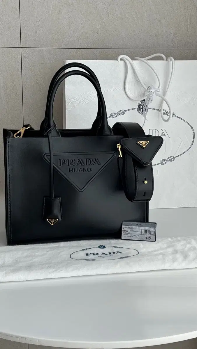 Prada Logo Embossed Leather Tote Bag Black