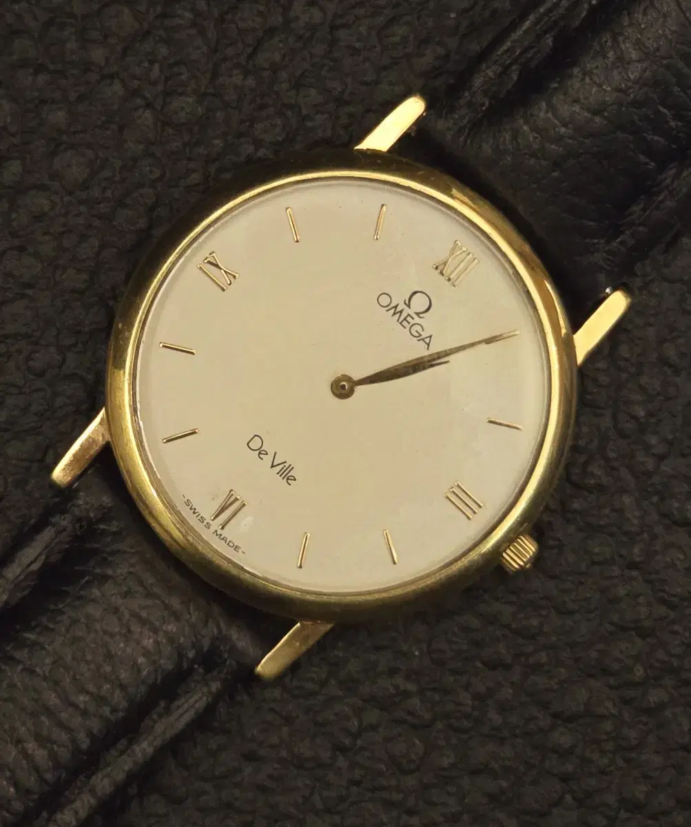 Omega De Ville 18k gold quartz watch for sale.