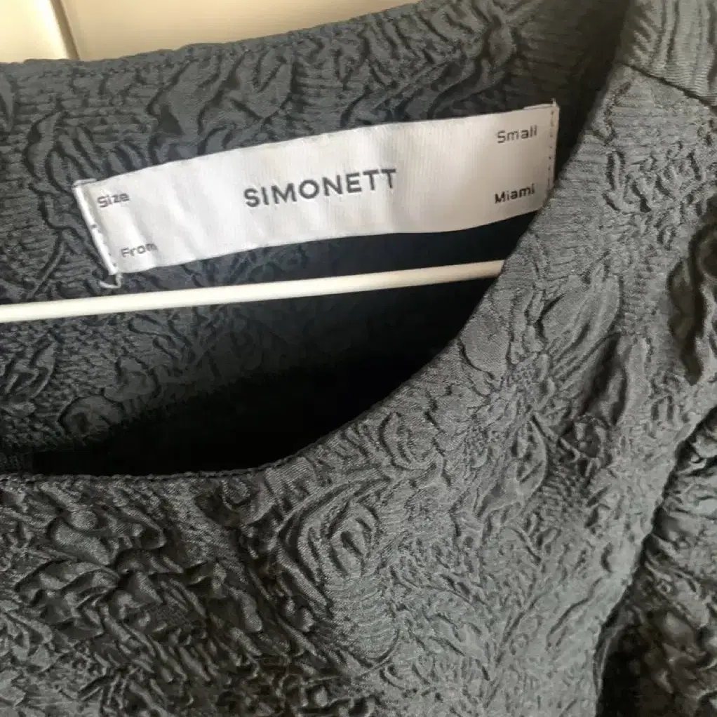 Simonett top