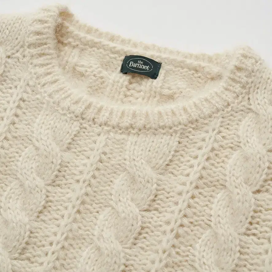 더바넷 Pope Cable Knit Sweater