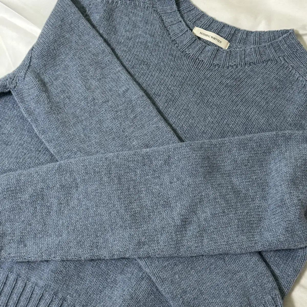 낫띵리튼 British crewneck wool pullover