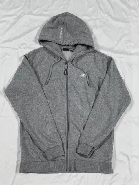 NEW BALANCE ESSENTIAL HOOD ZIP-UP