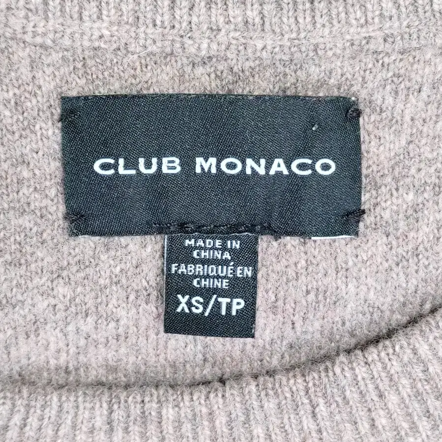 CLUB MONACO 클럽모나코 여성 잔 사선 스판 니트라운드티