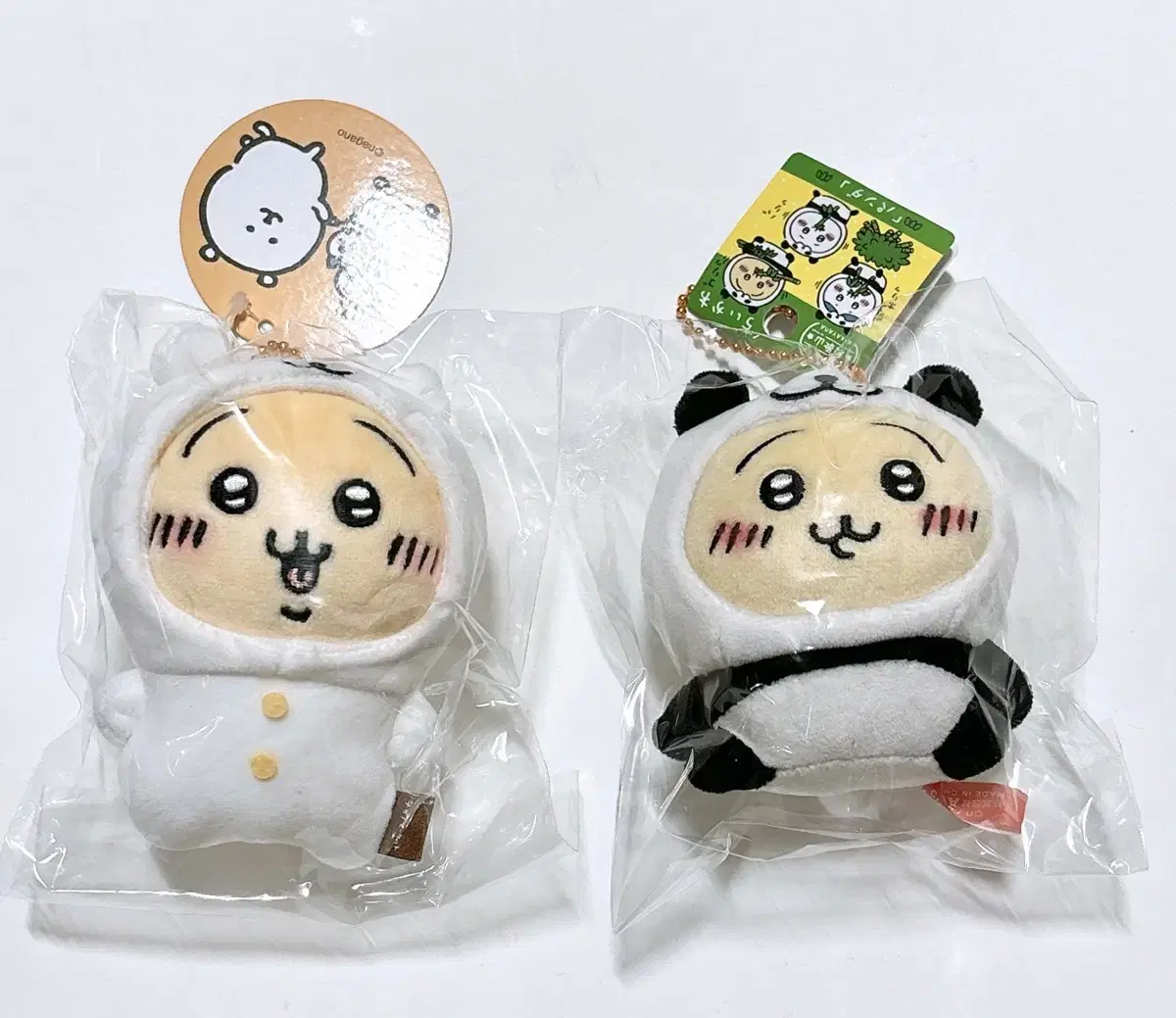 Chiikawa's mascot doll Traveling raincoat Hachiware Panda Usagi wearing a joke bear mask