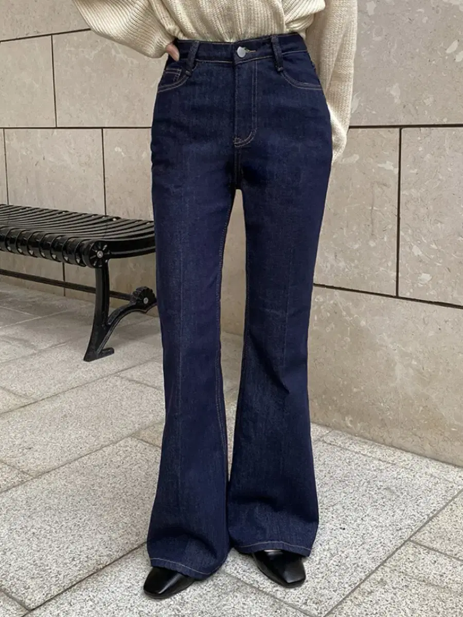 Non-fade, stretch denim pants with a kimono-style hem and boot cut